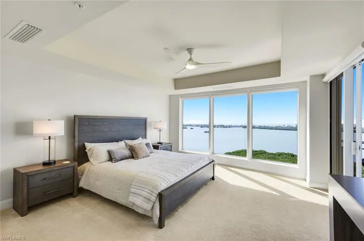 Following a day at the beach club or on the golfcourse, this lovely primary suite is where youwill happily "recharge."