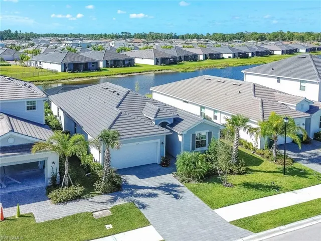 Aerial view of residential area with a nearby body of water