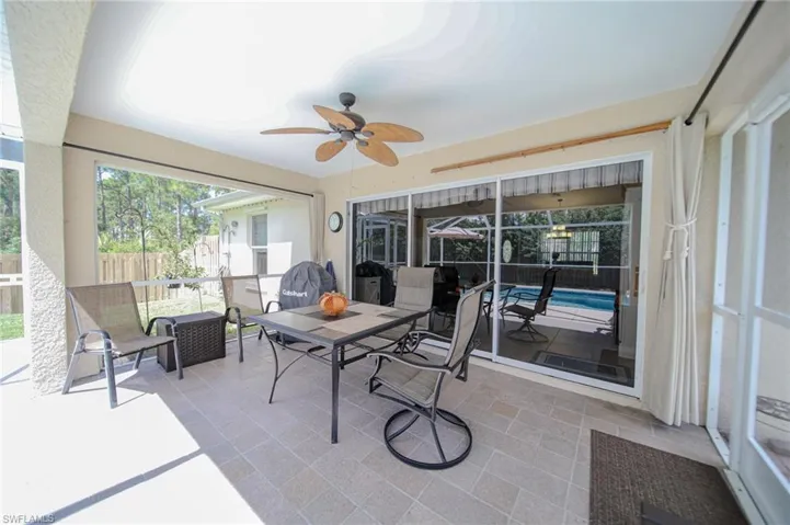 Sunroom with ceiling fan