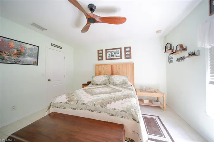 The Master Bedroom Has Tile And A Custom Ceiling Fan!!