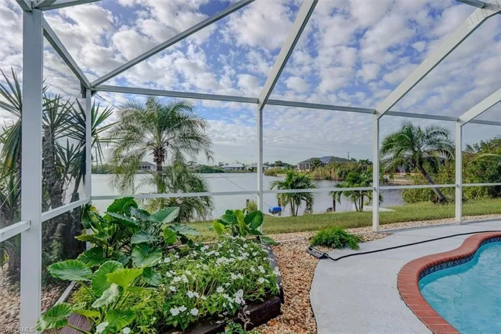 View of swimming pool with a water view