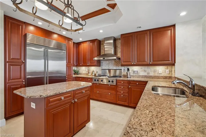 Kitchen with Gas Stove and Sub Zero Refrigerator