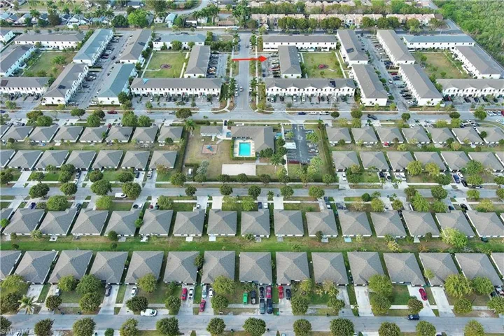 Aerial overview of property's location with nearby suburban area