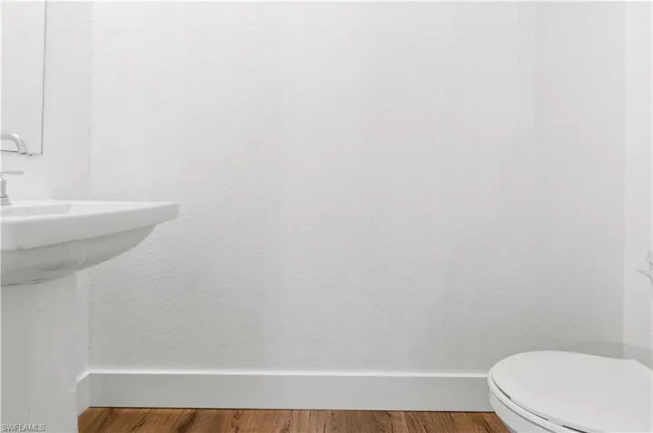 Bathroom featuring wood finished floors