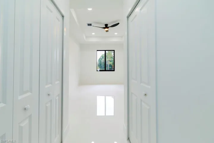 Unfurnished bedroom with visible vents and recessed lighting