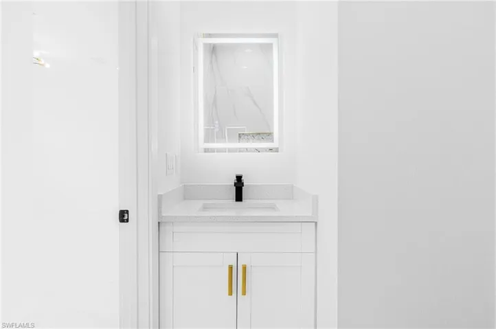 Bathroom featuring vanity
