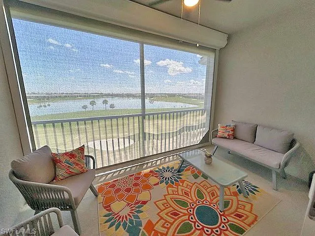 Screened Lanai w/Storm Smart electric shutter overlooking the golf course and water. You can still see out!