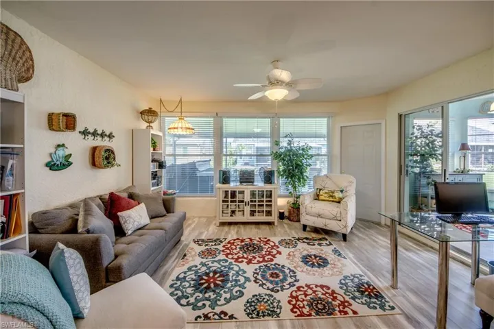 LOOKING TO LANAI.  KITCHEN ON RIGHT.