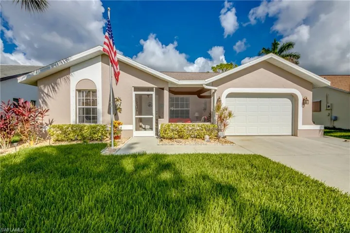 FRSDHLY PAINTED HOME PROTECTED WITH HURRICANE SHUTTERS, SOME IMPACT WINDOWS AND HURRICANE RATED GARAGE DOOR.