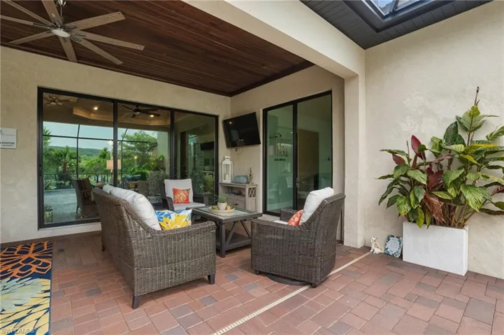 View of patio / terrace featuring a ceiling fan and an outdoor hangout area