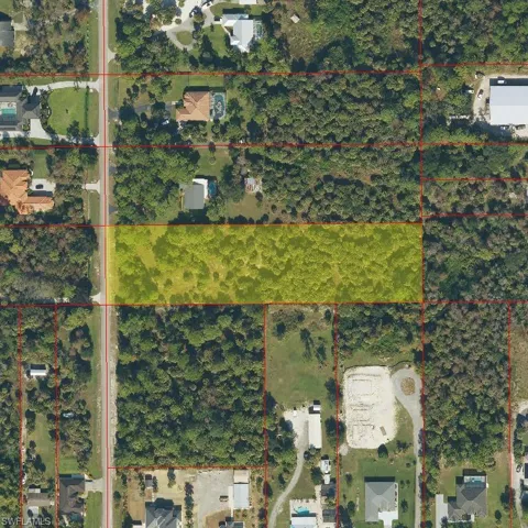 Aerial Map. Depicting the property highlighted in yellow within a broader land area