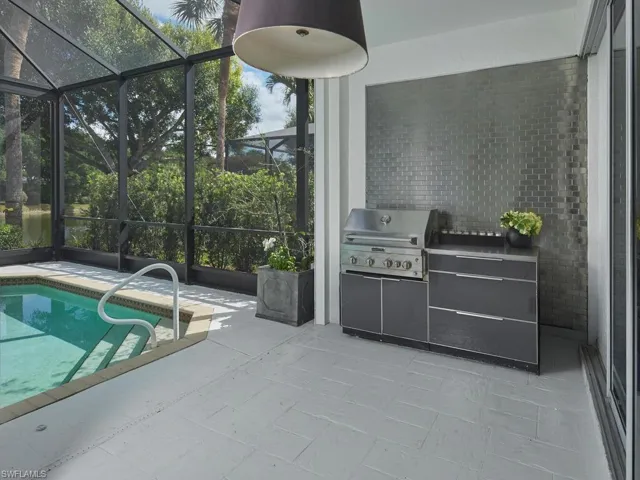 Covered outdoor lanai with grilling station