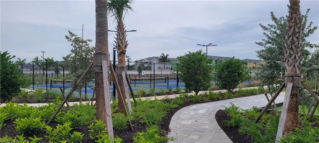 View of community featuring a pickleball court
