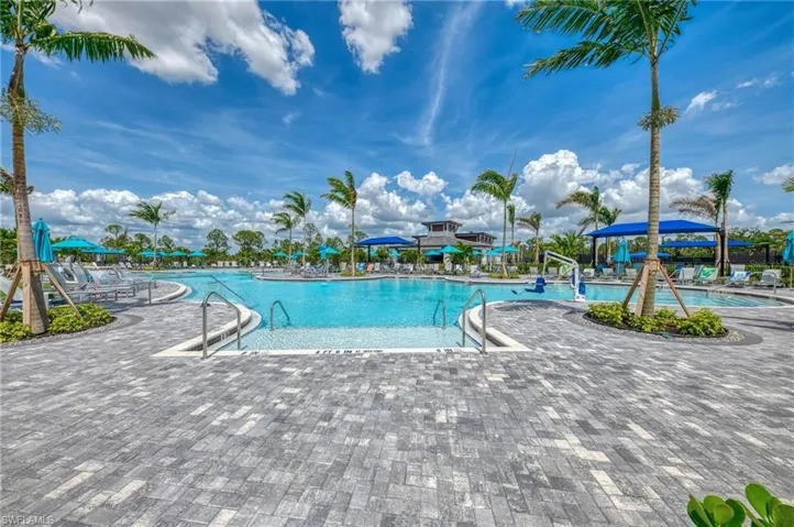 Community pool featuring a patio area