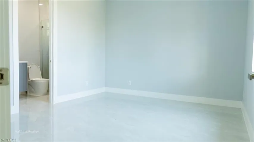 Spare room with baseboards