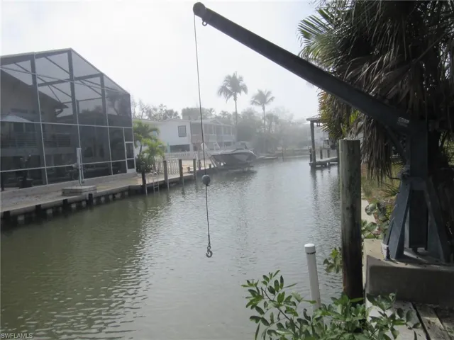 Water view with a boat dock