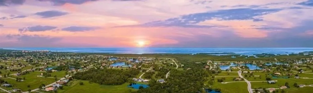 Aerial view at dusk with a water view