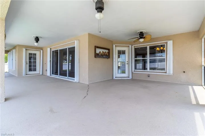 View of patio with ceiling fan