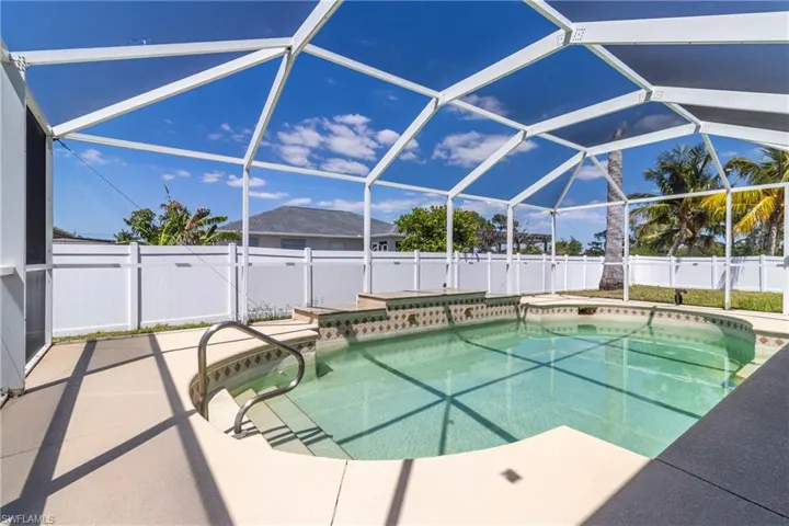 View of swimming pool with a patio area, a fenced backyard, a fenced in pool, and a lanai