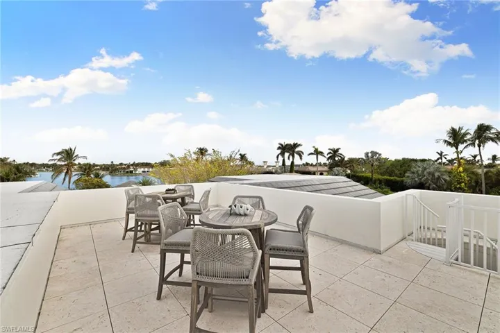 Rooftop deck featuring both Gulf and Bay views