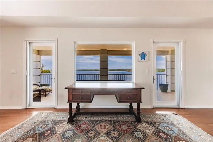 Home office featuring hardwood / wood-style floors