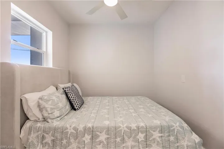 Bedroom featuring ceiling fan