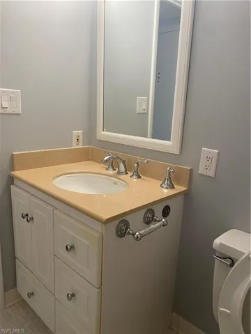Bathroom with vanity and toilet