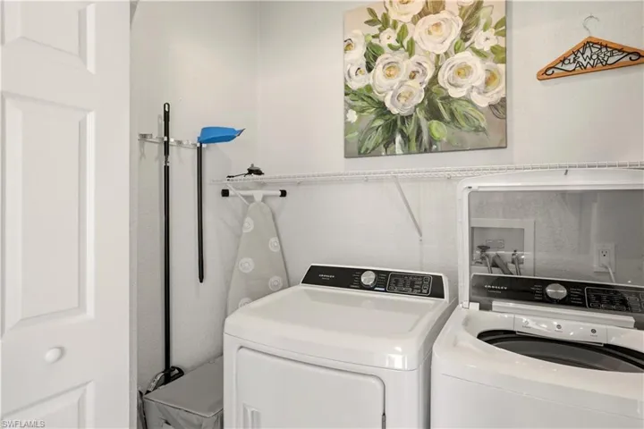 Laundry area featuring washing machine and dryer