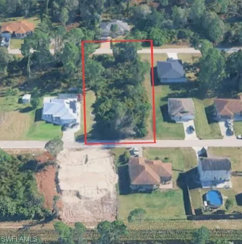 Aerial perspective of suburban area with property boundaries highlighted