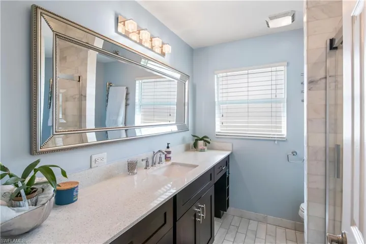 Guest bathroom designed for comfort and convenience with contemporary details.