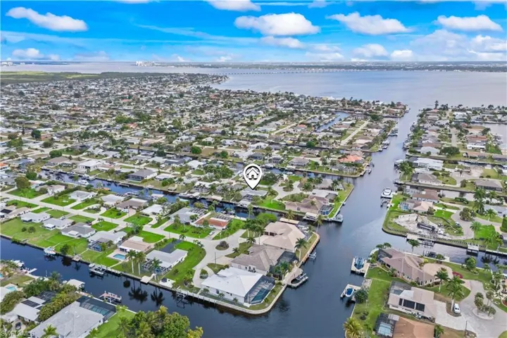 Aerial shot of tranquil canal views and waterfront lifestyle opportunities.