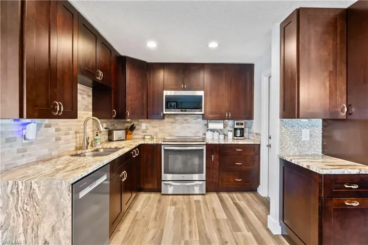 Modern kitchen with abundant storage, sleek countertops, and plenty of prep space.