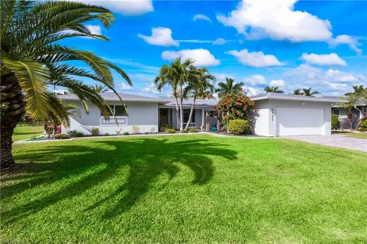 Front façade highlighting the property’s architectural details and oversized lot.