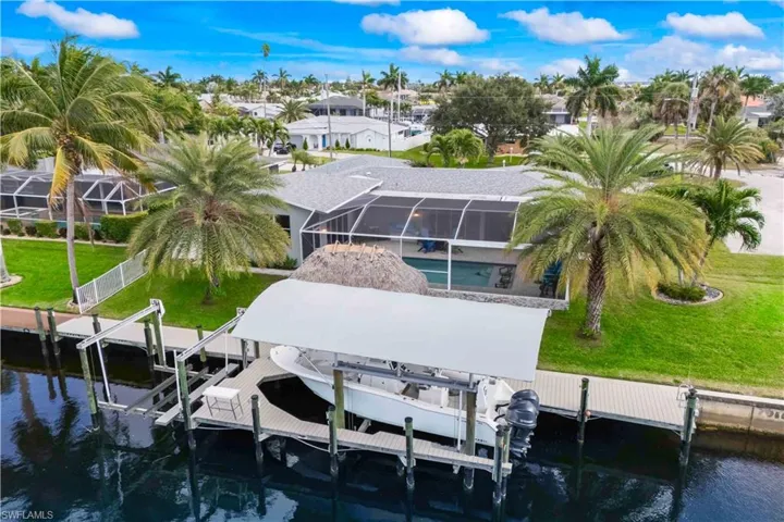 Dock and lift combination perfect for boating enthusiasts and water recreation.