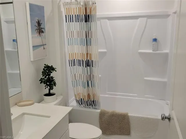 Full bathroom with tub and shower