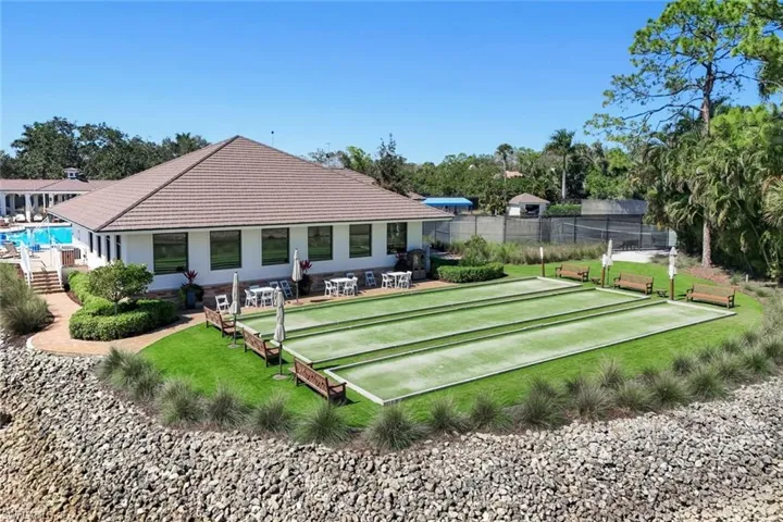 View of community featuring a bocce ball area and a patio area