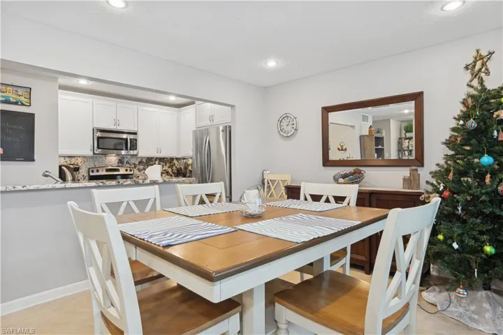 Dining room featuring light tile patterned flooring