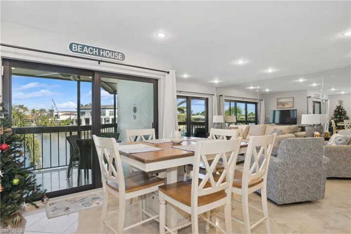 Dining space featuring light tile patterned flooring