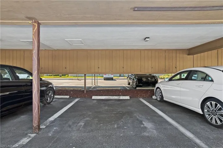 Garage featuring wooden walls