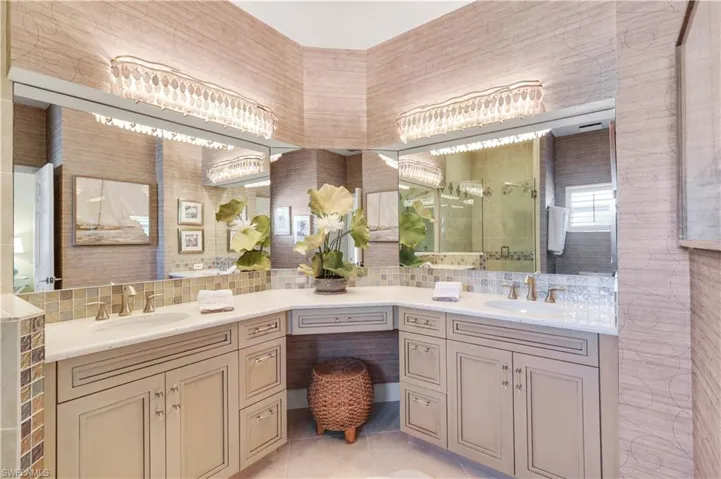 Plenty of counter space and storage make this bath both attractive and functional.