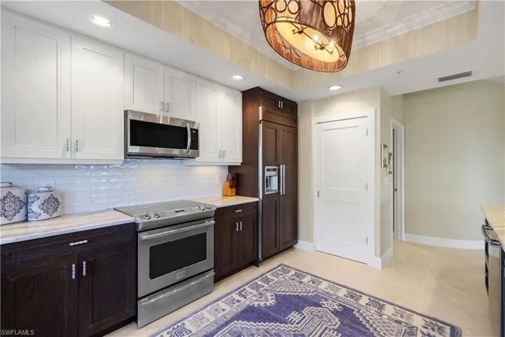 Ample cabinetry and workspace make this kitchen as functional as it is attractive.