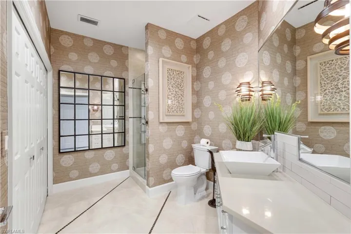 Relax and unwind in the spacious bath with a separate tub and shower.