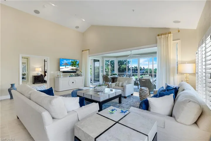 Another view of the living area with the enclosed lanai just beyond.
