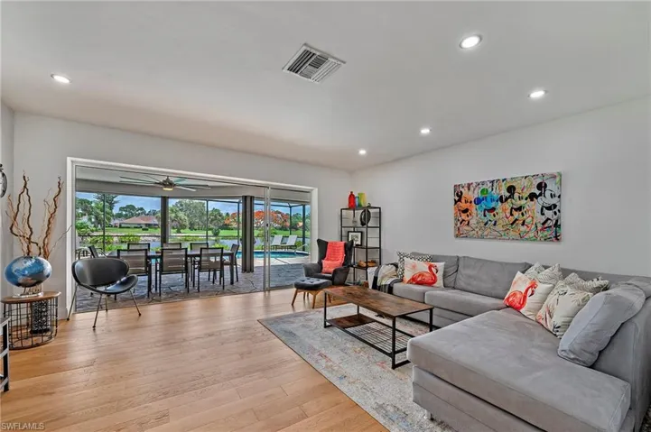 Living room with view of pool