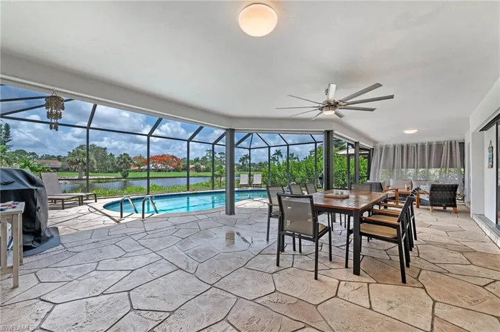 Outdoor dining area with ceiling fan
