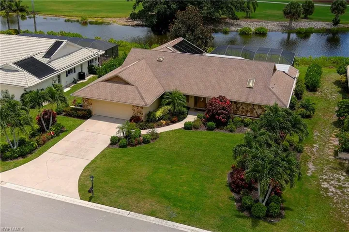 Arial with water view and peak of golf course