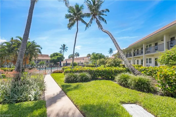 View of property's community with a swimming pool