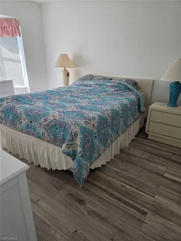 Bedroom featuring wood finished floors