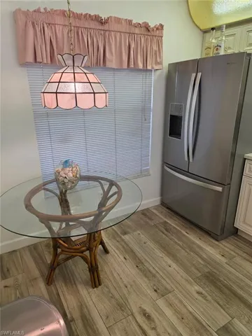 Dining room with light wood-style floors
