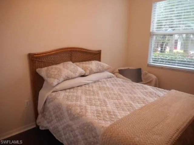 Bedroom featuring baseboards